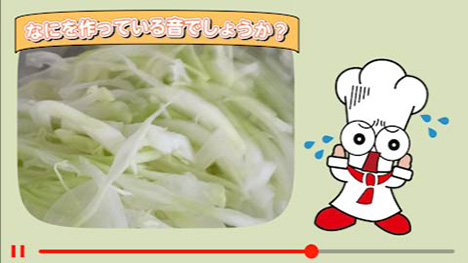 何かを切っているタニッ。